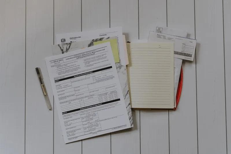 Organized checklist and paperwork for vacation rental cleaning quality standards